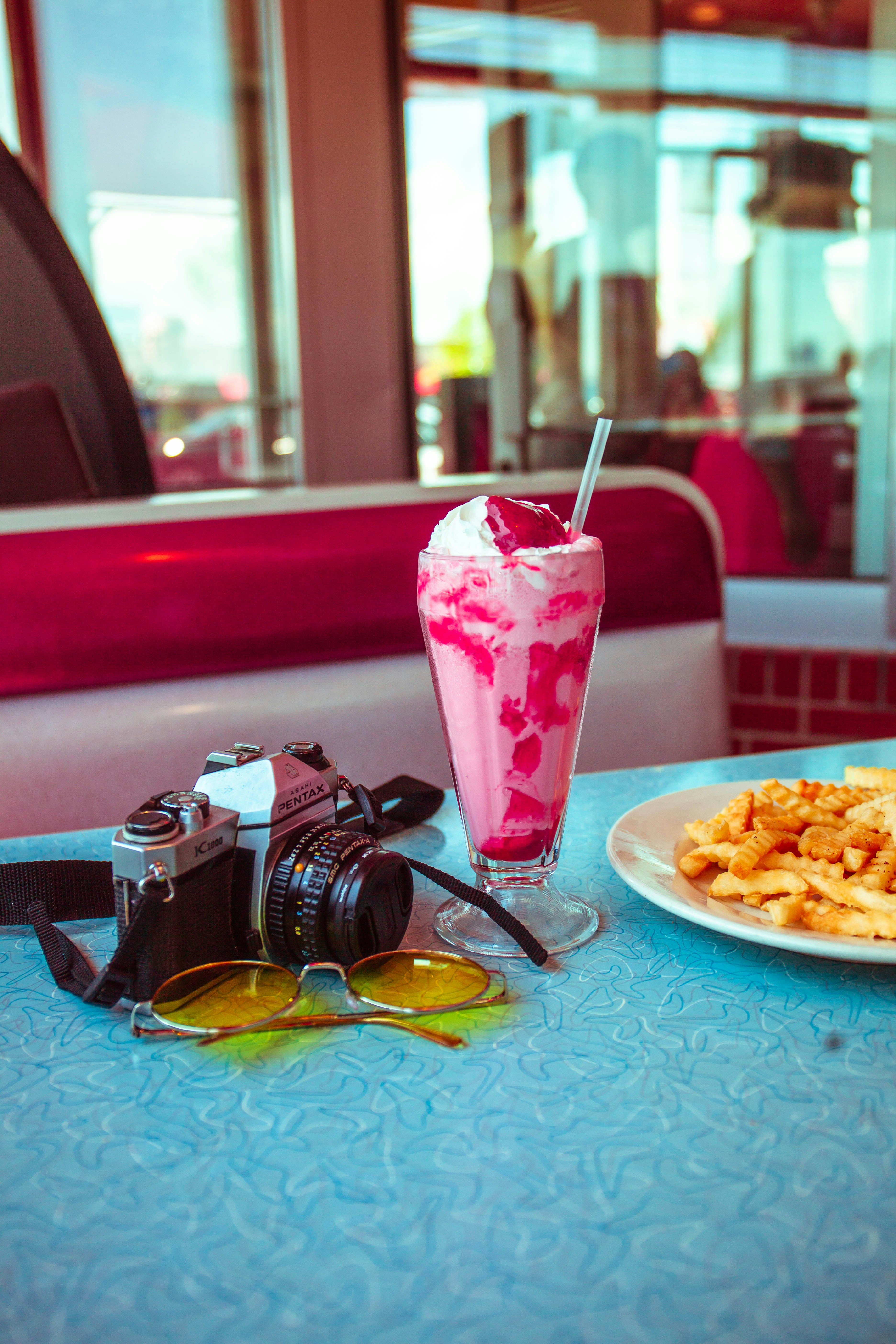 Retro diner with milkshake and camera