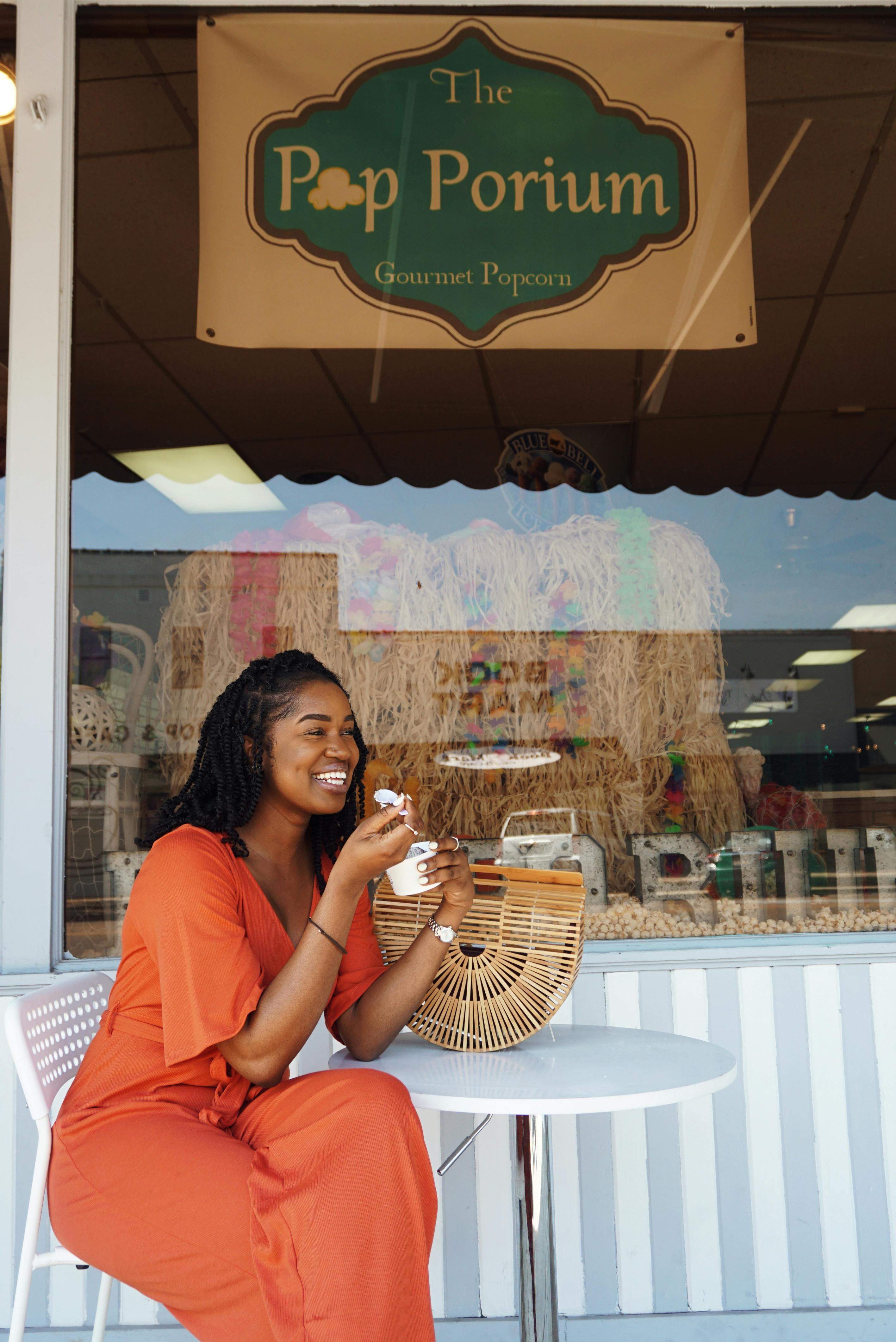 Woman enjoying ice cream at a local shop